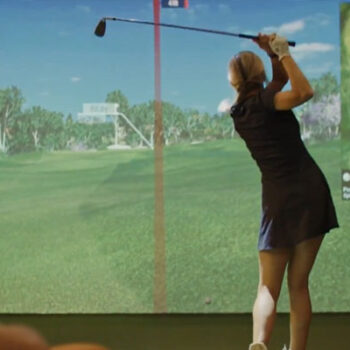 golfin-idra-golf-simulator-launch-monitor-young-female-player-v1-600